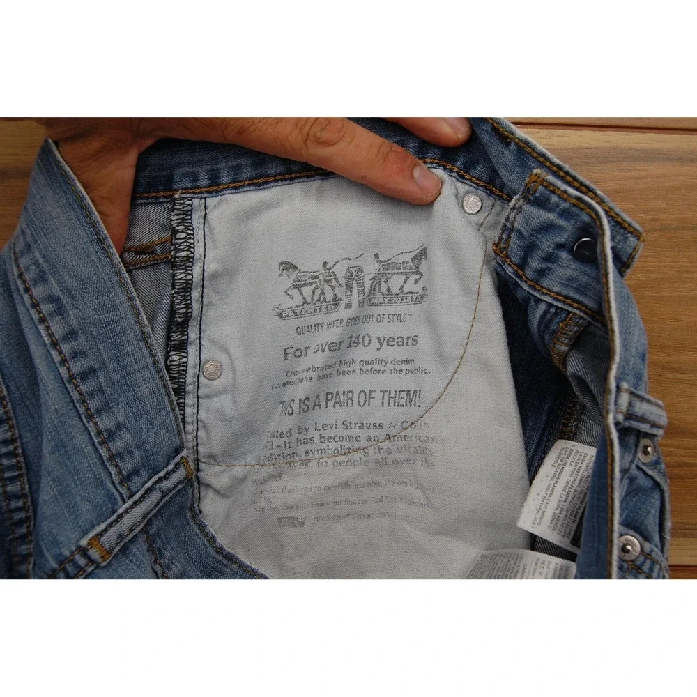 Levis 505 Jeans Mens 33x32 Light Blue Straight Leg Distressed Zip Fly 00505-0235